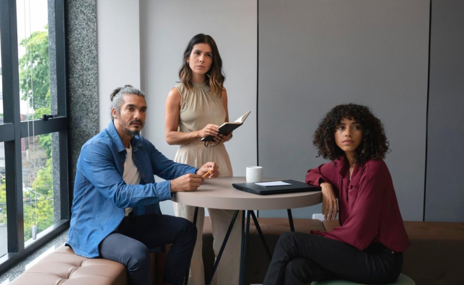 Investment community members discussing market strategies in collaborative environment